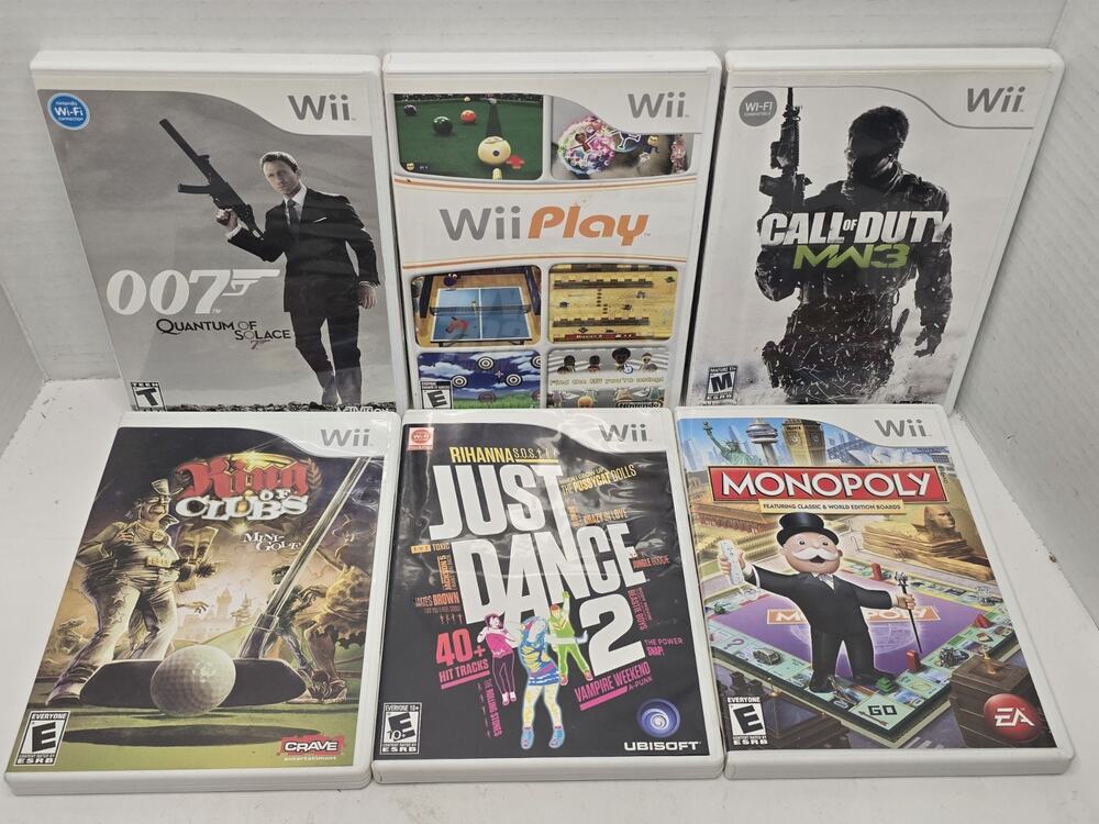 Lot of 6 Ninteno Wii Games Very good condition Play 007 Cod Dance Monopoly King